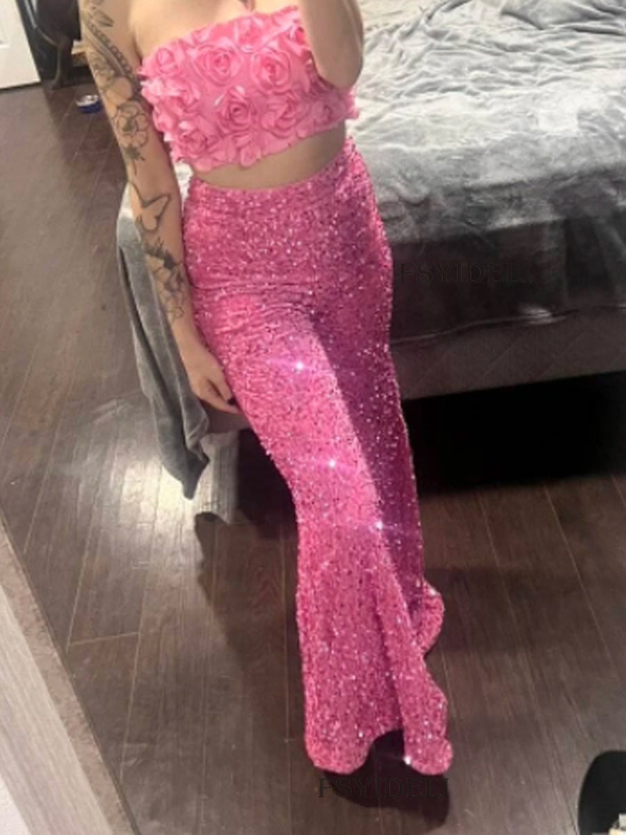 Pink sequin wide leg pants with a flowy cut.