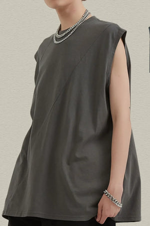 Dark gray asymmetric panel sleeveless top with a diagonal seam detail.