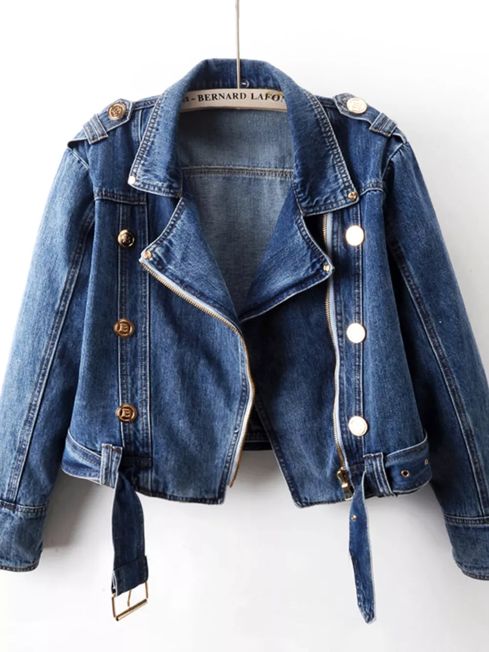 denim jacket in medium wash blue featuring asymmetrical zip and regular fit