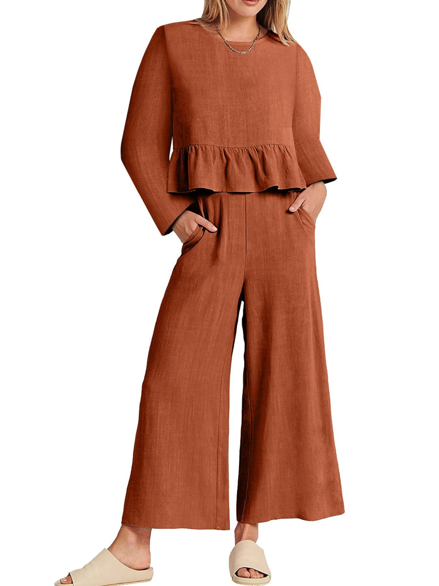 Ruffled hem two-piece set in orange with wide leg pants and pockets.