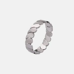 Sculpted gold leaf bracelet in silver tone with overlapping petal links