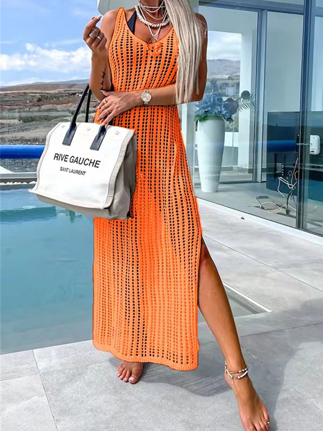 Orange open-knit maxi cover-up with V-neck and high slit, perfect for beachwear.