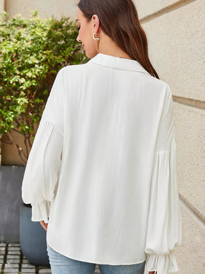 White linen blend shirt with bishop sleeves and ruffled cuffs