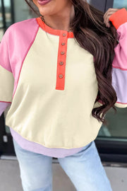 65% polyester, 35% cotton Care instructions: Machine wash cold pullover sweater in orange with relaxed silhouette