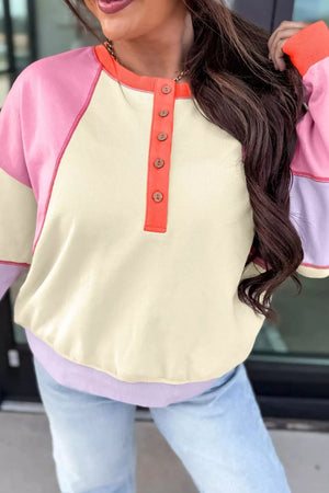 65% polyester, 35% cotton Care instructions: Machine wash cold pullover sweater in orange with relaxed silhouette