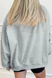 50% polyester, 50% cotton Care instructions: Machine wash cold sweatshirt in light grey with oversized silhouette