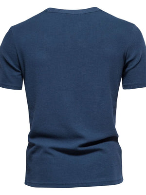 Navy textured crew-neck t-shirt knit with short sleeves.