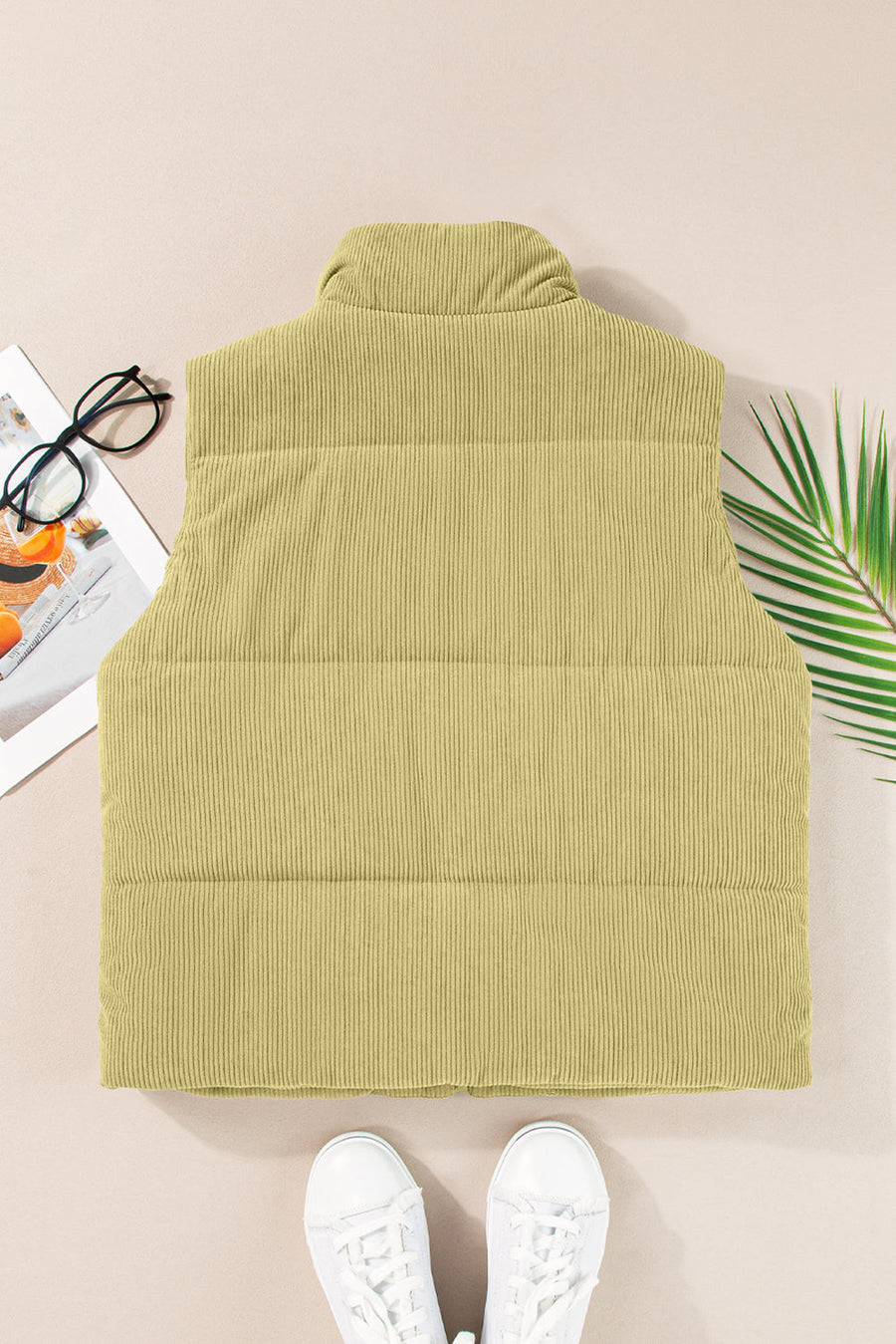 Corduroy padded collar vest in sage with horizontal quilting detail.