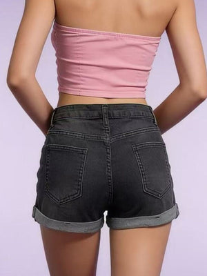 Black denim shorts with cuffed hem and button fly, showing back pockets.
