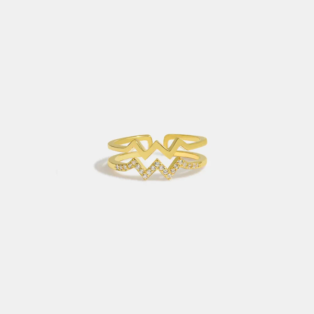 Gold zigzag split band ring with pave crystal detail