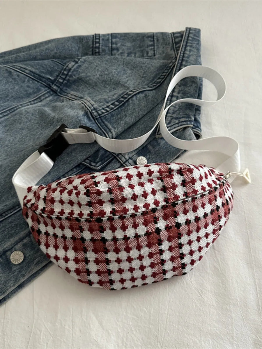 Textured houndstooth belt bag in Deep Red with adjustable white strap