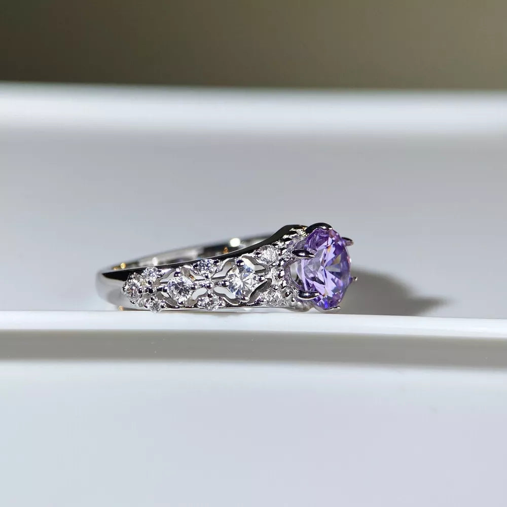 ring in Heliotrope Purple with ornate and faceted stones