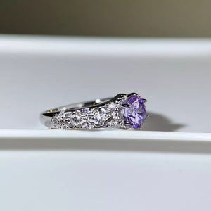 ring in Heliotrope Purple with ornate and faceted stones