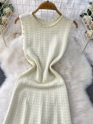 White knit midi dress with pearl neckline detail and textured pattern
