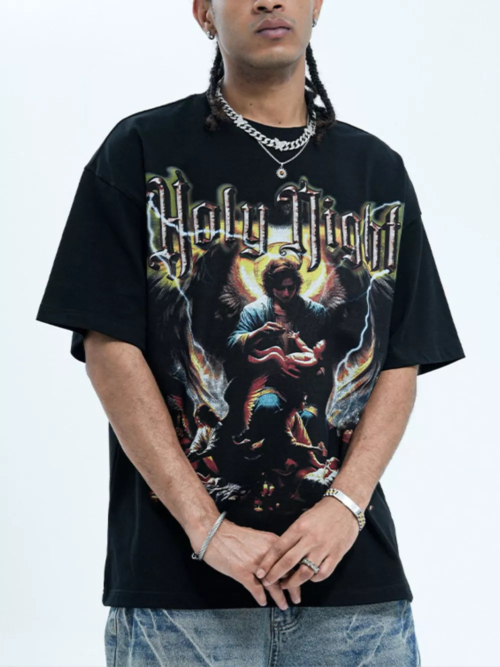 Black oversized cotton t-shirt with Holy Night graphic print and angelic imagery.