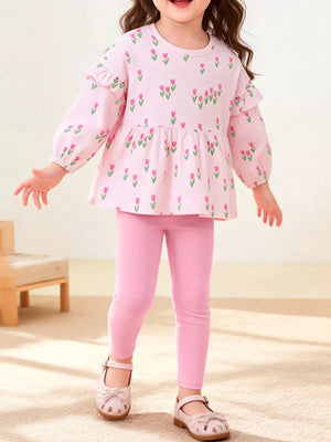 light pink peplum top and leggings set with floral and crew neck