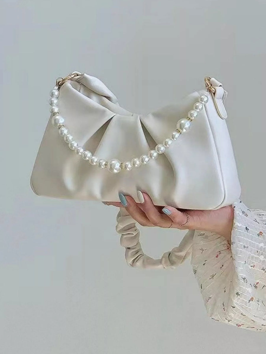 Beige ruched shoulder bag with pearl strap detail