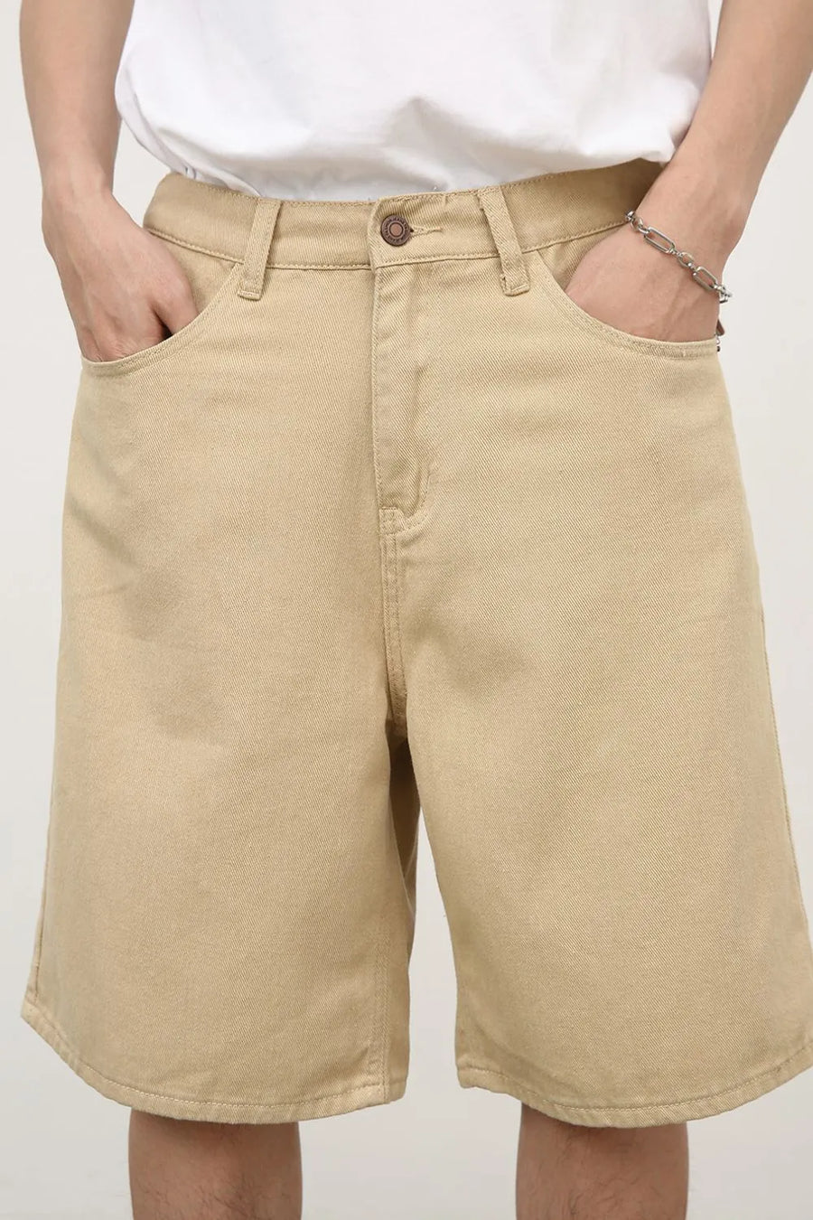 Textured denim bermuda shorts in Khaki with a casual fit and button fly.