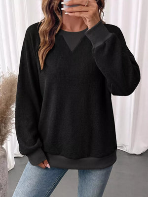 blush pink sweatshirt with ribbed cuffs and long sleeve