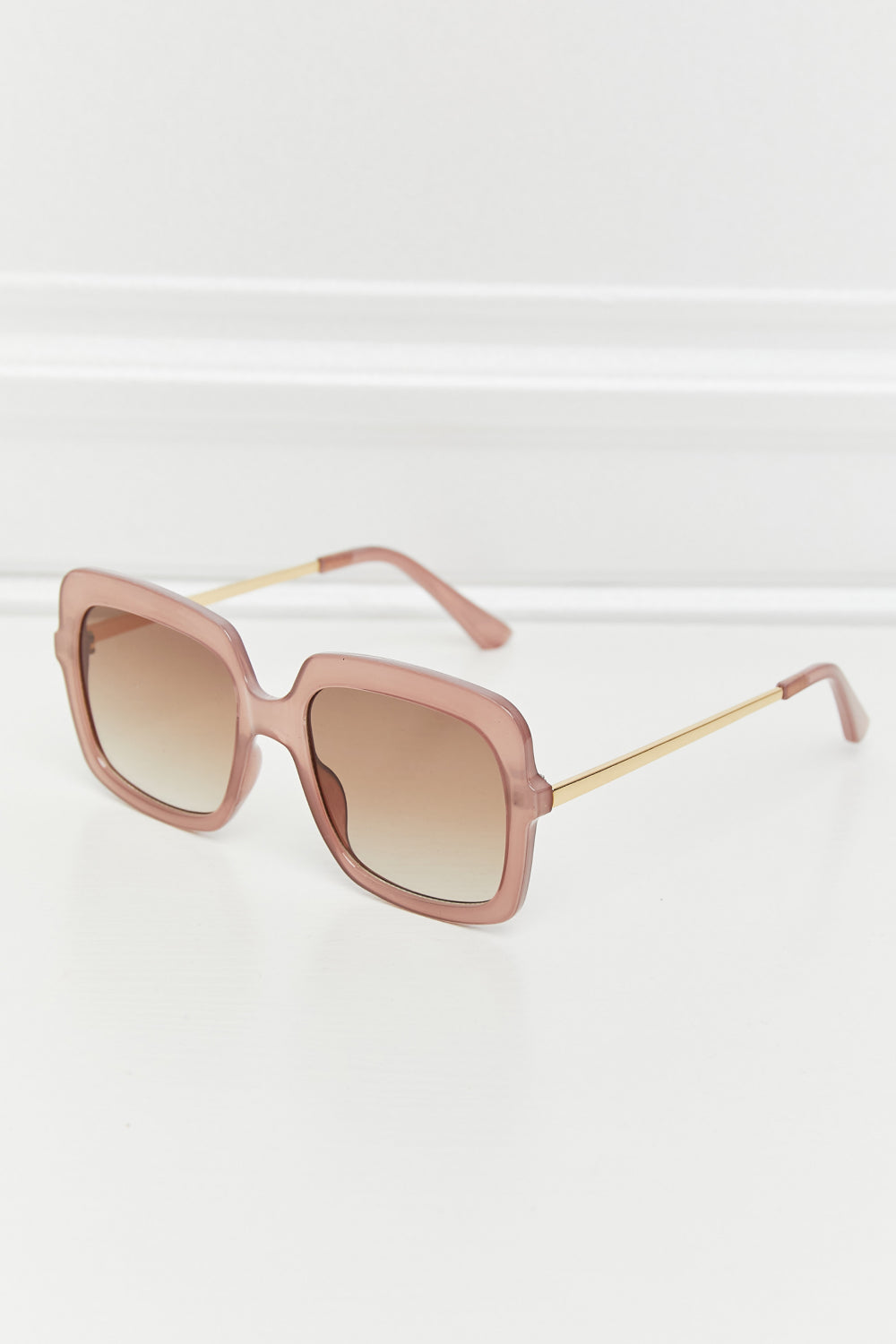Sculpted square frame sunglasses in khaki with gradient brown lenses and gold temples.