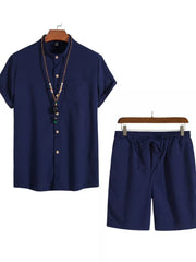Navy two-piece set for men with mandarin collar shirt and drawstring shorts.