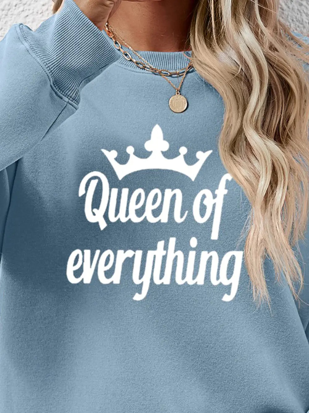 Misty Blue sweatshirt with white Queen of Everything graphic and crown detail.