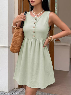 Green cotton A-line dress with button detail and round neckline