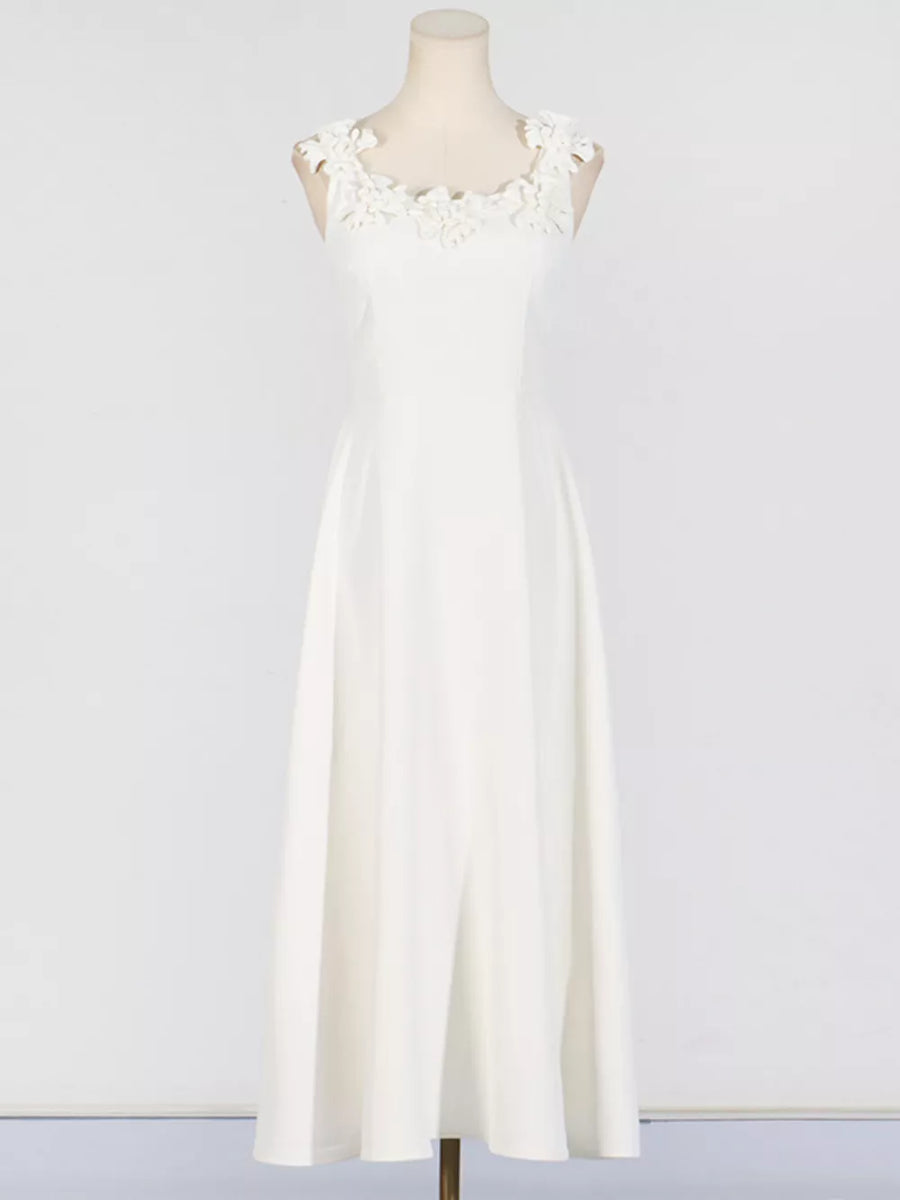 White sleeveless maxi dress with floral applique neckline