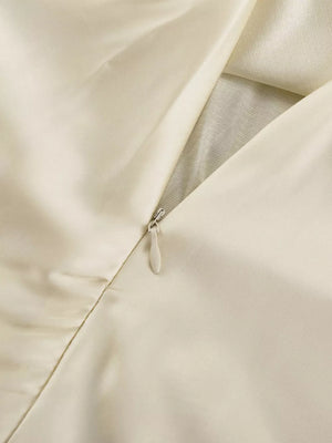 Cream satin dress with concealed zipper detail