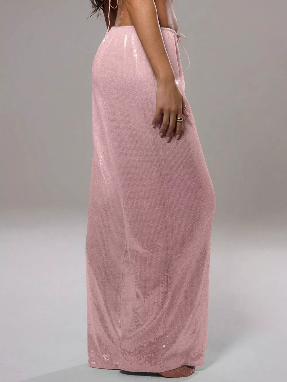 Dusty pink sequin wide leg pants with drawstring waist.