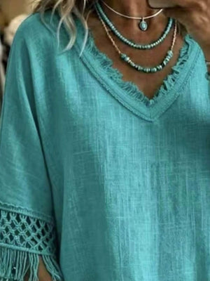 Turquoise blouse with tunic-length and pullover