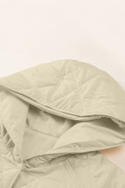 Beige diamond quilted hooded snap jacket detail with snap closure