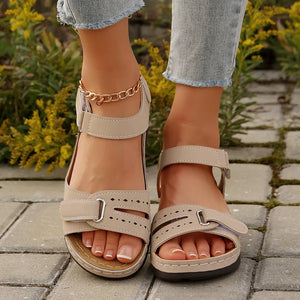 Beige perforated detail velcro wedge sandals with gold chain ankle strap detail