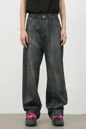 Washed denim wide-leg trousers in dark, featuring a relaxed fit and casual style.