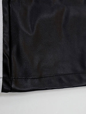 Black faux leather wide leg track pants with white side stripe detail.