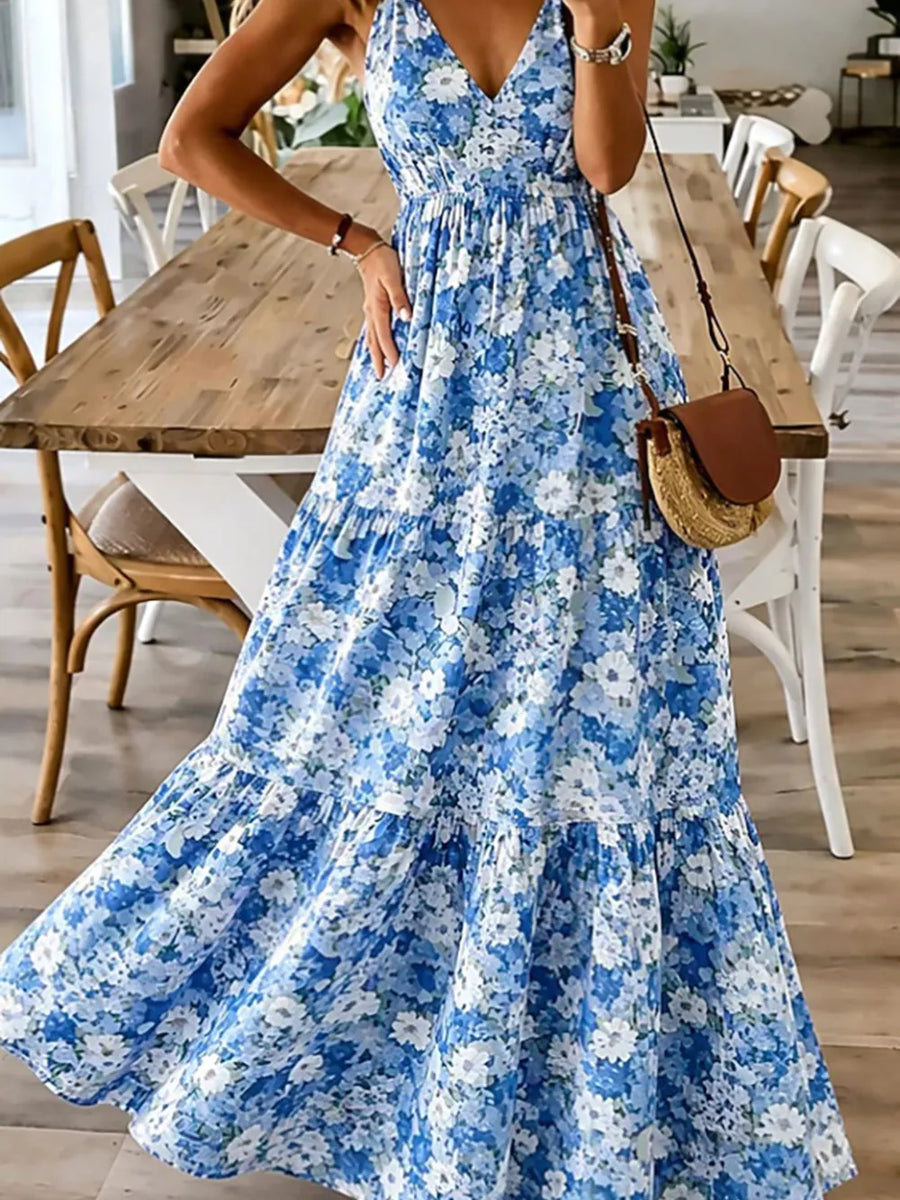 Sky Blue floral tiered maxi dress with spaghetti straps and a V-neck.