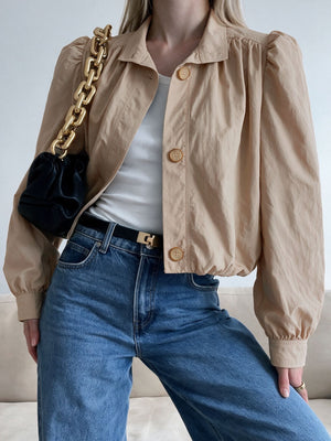 100% polyamide Care instructions: Machine wash cold jacket in Light Khaki Color with relaxed silhouette
