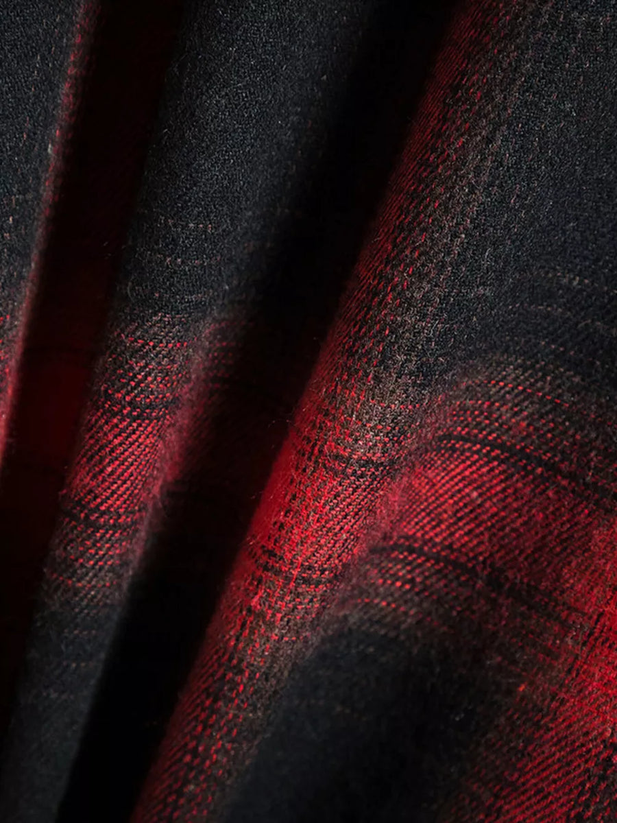 Classic plaid short-sleeve men's shirt in black and red cotton fabric.