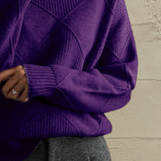 Deep Purple textured diamond knit turtleneck pullover sweater with ribbed cuffs.