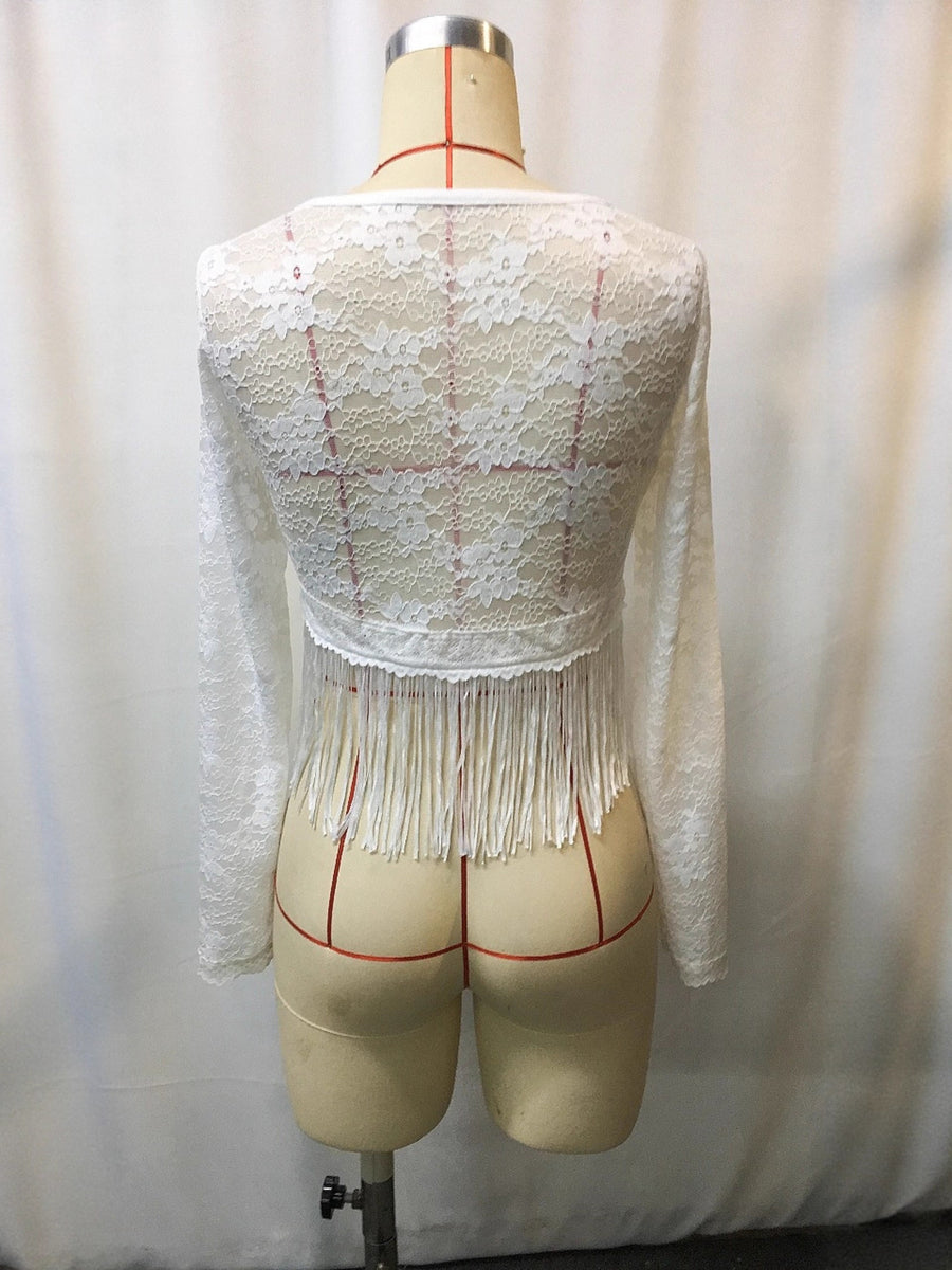 White lace long sleeve top with fringe hem detail