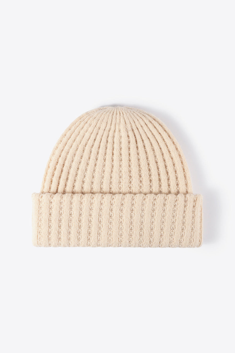 Beige ribbed knit beanie with textured detail