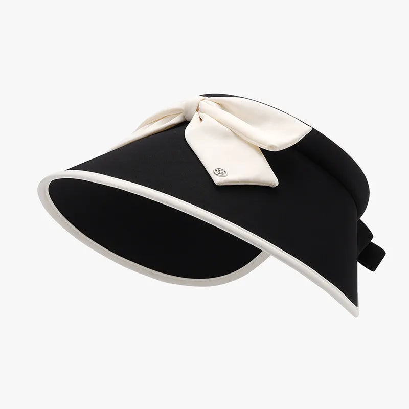 Black sun visor with ivory bow and contrast trim