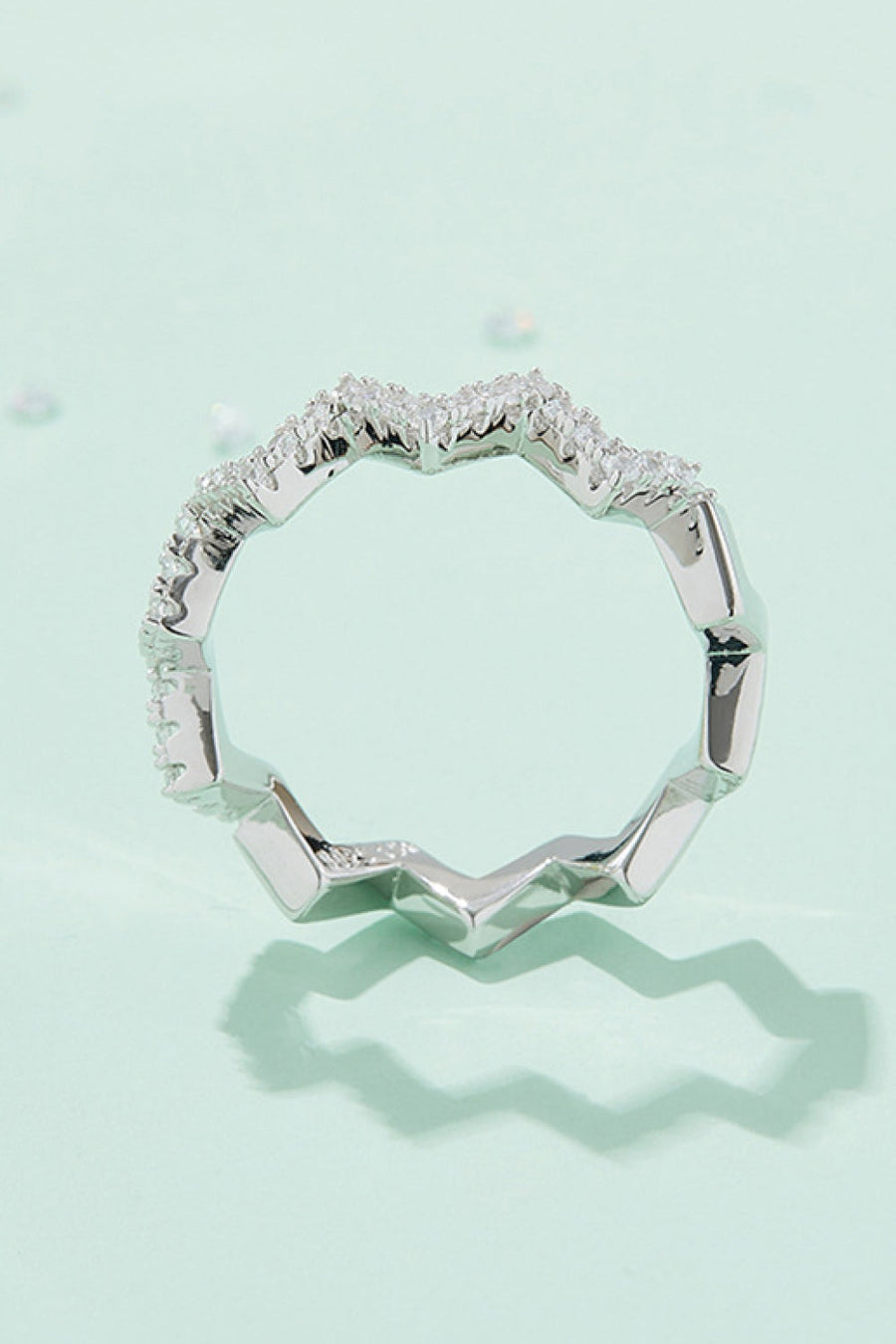 Silver zigzag pavé moissanite band ring with geometric details