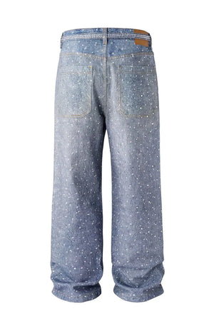 Ombré crystal embellished wide leg jeans in dark wash denim with scattered rhinestones.