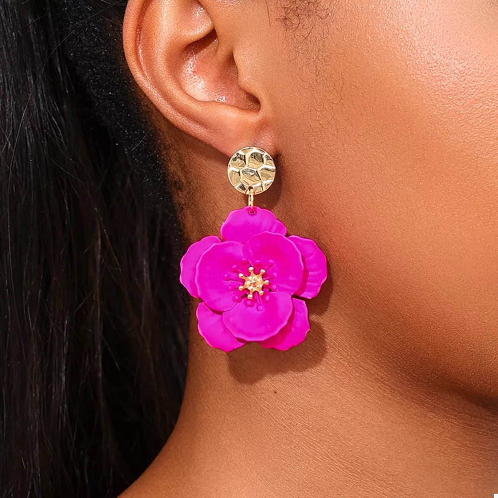 earrings in fuchsia featuring drop design and drop fit
