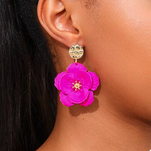 earrings in fuchsia featuring drop design and drop fit
