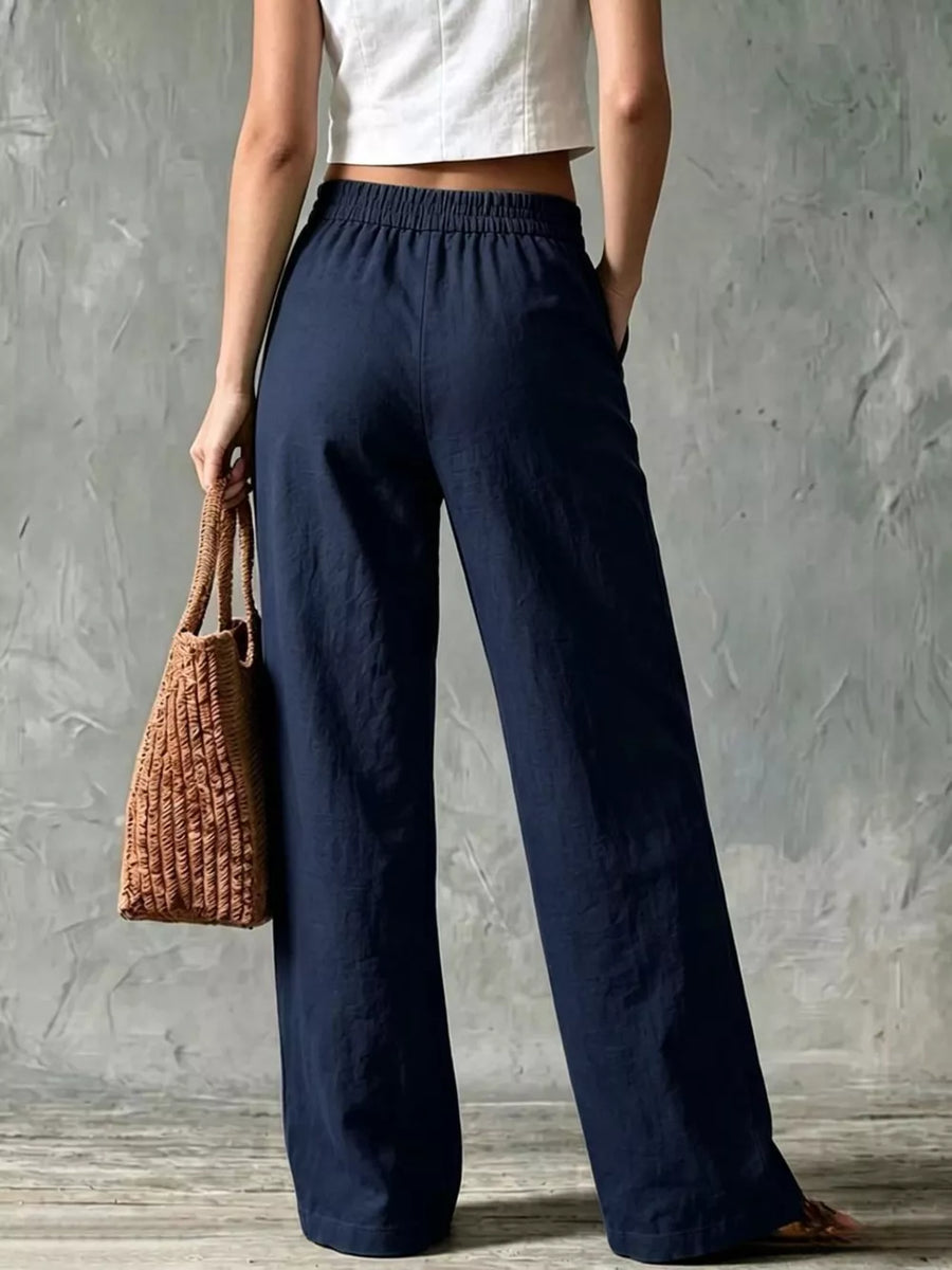 Navy linen wide-leg pants with elastic waistband and pockets