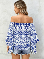 off-shoulder top in Black with smocked and hip-length