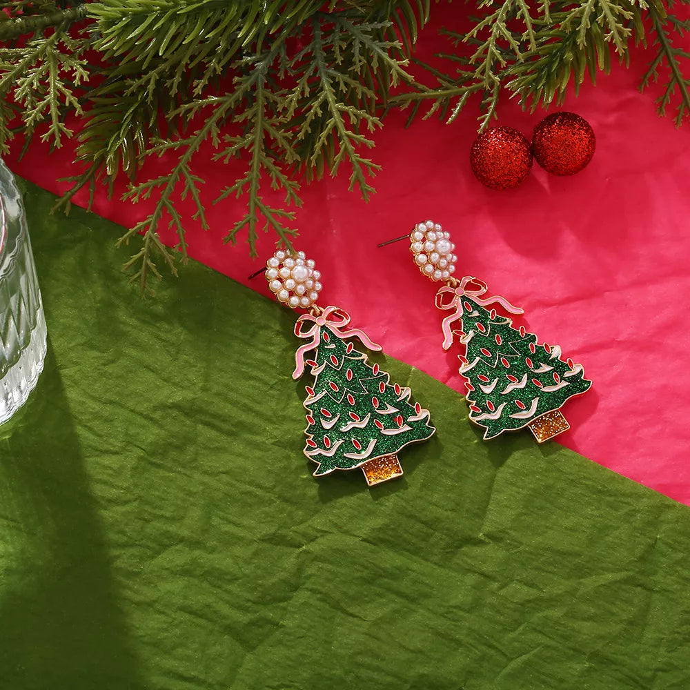 earrings in green featuring dangle and dangle fit
