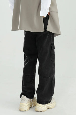 Black washed denim utility cargo pants with front and side pockets.